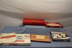 lot 377 image: Collection of 5 Classic Board and Card Games including Monopoly, Scrabble, and Rummikub