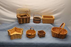 lot 14 image: Set of 8 Handwoven Decorative Baskets in Various Sizes and Shapes