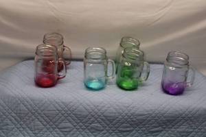 lot 31 image: Set of 6 Colorful Glass Mason Jars with Handles