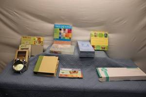 lot 34 image: Lot of Crafting and Scrapbooking Supplies Including Clock, Trimmer, and Bundles