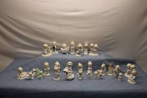 lot 40 image: Collection of 20 Precious Moments Figurines Including Wedding and Baby Themes