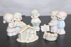 lot 48 image: Set of 5 Precious Moments Christmas Figurines Collection