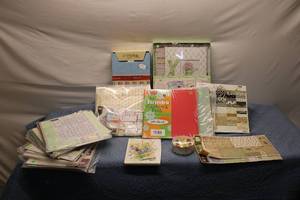 lot 55 image: Mixed Lot of Scrapbooking Supplies Including Cardstock, Stickers, and Travel Kit
