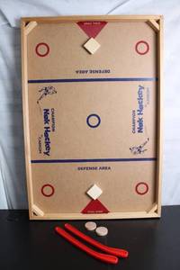 lot 69 image: Vintage Nok Hockey Game Set with 2 Pucks and 2 Sticks