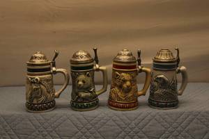 lot 101 image: Set of 4 Decorative Animal-Themed Beer Steins