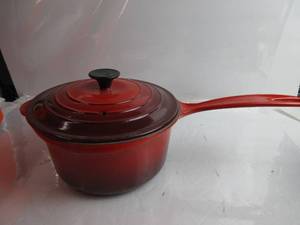 lot 46 image: Le Creuset Enameled Cast-Iron 2-34-Quart Iron Handle Precision Pour Saucepan, Cherry HAS SCRATCHES, NEW, OPEN BOX