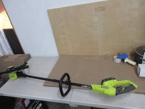 lot 84 image: RYOBI 18V ONE 13 STRING TRIMMEREDGER COMES WITH CHARGER AND BATTERY, TESTED, WORKS, USED