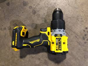 lot 54 image: DEWALT 20V Compact Cordless 12 in. Hammer Drill (Tool Only) Customer Returns See Pictures