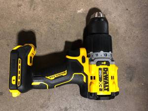 lot 41 image: DEWALT 20V Compact Cordless 12 in. Hammer Drill (Tool Only)  Customer Returns See Pictures