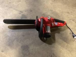 lot 45 image: Homelite 16 in. 12 Amp Electric Chainsaw Customer Returns See Pictures