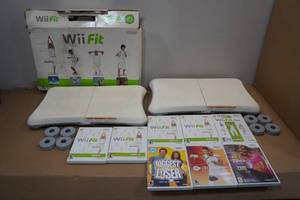 lot 68 image: Nintendo Wii Fit Games and Accessories