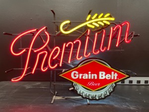 lot 22 image: Grain Belt Premium wheat with bottle cap, neon
