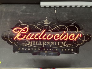 lot 108 image: Bud Millenium, black and gold plexi background, red neon Budweiser