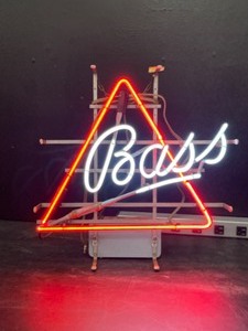 lot 117 image: Bass Ale with neon triangle logo