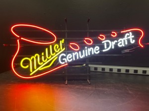 lot 63 image: Miller Genuine Draft, MGD with neon saxophone
