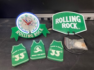 lot 70 image: Rolling Rock neon clock, basketball hoop, and 3 can coozies  can coolers