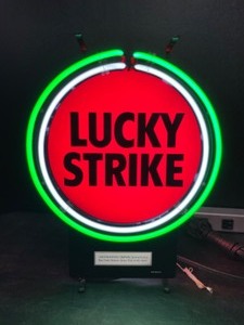 lot 73 image: Lucky Strike cigarettes, tobacco, neon