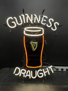 lot 76 image: Guinness Draught neon pint glass