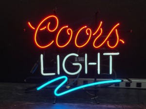 lot 100 image: Coors Light, red script Coors, white neon Light with blue neon wave
