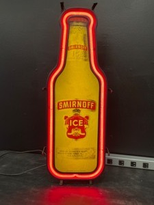 lot 121 image: Smirnoff Ice Vodka bottle with painted Ruby Red neon border