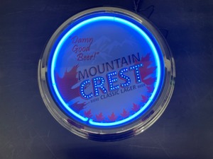 lot 147 image: Mountain Crest Classic Lager, round light with neon