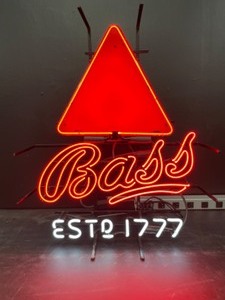 lot 29 image: Bass Ale, Bass est. 1777  neon with triangle logo, looks new