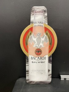 lot 176 image: Bacardi Silver Rum, tin tacker with bat