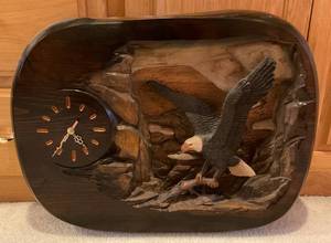 lot 64 image: Hand Carved By Lex Blankman Eagle Clock 18 L x 24 H 3 12 W