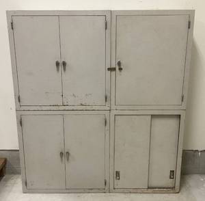 lot 75 image: Large Metal Four Door With Shelves Storage Cabinet 54 L x 60 H x 12 W (BRING HELP TO LOAD)