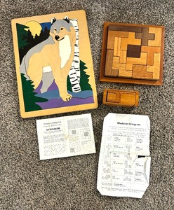 lot 23 image: Three Wooden Puzzles