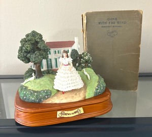 lot 33 image: 1936 Edition Gone with the Wind Book with Music Box Figurine