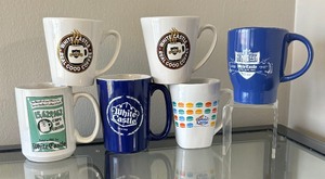 lot 59 image: Six White Castle Mugs