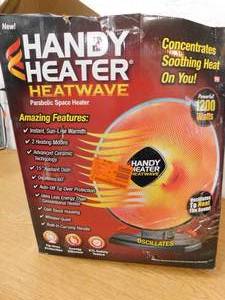 lot 83 image: HANDY HEATER 1200-Watt Electric Oscillating Ceramic Parabolic Space Heater