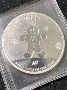 lot 06 image: 1 TROY OZ .999 FINE SILVER 2024 HAPPY HOLIDAYS ROUND
