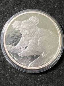 lot 12 image: 2009 AUSTRALIAN KOALA 1 TROY OZ .999 FINE SILVER IN AIRTITE