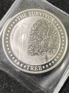 lot 16 image: 1 TROY OZ .999 FINE SILVER SURVIVOR TREE ROUND