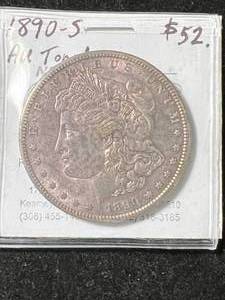 lot 25 image: 1890-S US MORGAN SILVER DOLLAR AU TONED