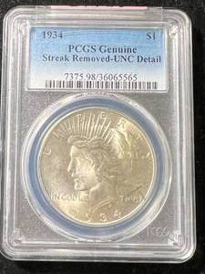 lot 30 image: 1934 US PEACE SILVER DOLLAR PCGS UNC DETAIL
