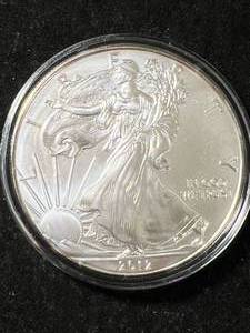 lot 31 image: 2012 AMERICAN SILVER EAGLE 1 TROY OZ .999 FINE SILVER IN AIRTITE