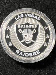lot 39 image: 27.5 GRAMS OF 925 STERLING SILVER LAS VEGAS RAIDERS ROUND