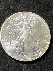 lot 54 image: 1989 AMERICAN SILVER EAGLE 1 TROY OZ .999 FINE SILVER
