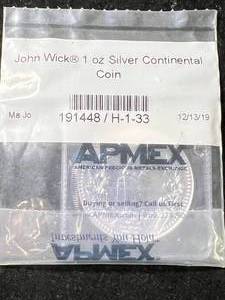 lot 58 image: 1 TROY OZ .999 FINE SILVER JOHN WICK ROUND