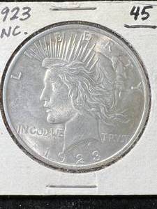 lot 62 image: 1923 US PEACE SILVER DOLLAR UNC