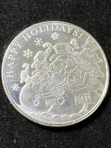 lot 64 image: 1 TROY OZ .999 FINE SILVER 2024 HAPPY HOLIDAYS ROUND