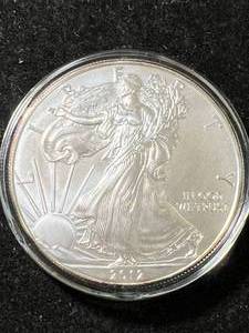 lot 68 image: 2012 AMERICAN SILVER EAGLE 1 TROY OZ .999 FINE SILVER IN AIRTITE