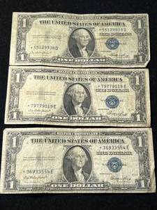 lot 100 image: 3 US BLUE SEAL $1 SILVER CERTIFICATE STAR NOTES