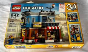 lot 17 image: LEGO Creator Corner Deli 31050 467 Piece Set - NewSealed