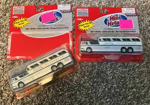 lot 109 image: (2) 1954 Scenicruiser Greyhound Bus GMC PD-4501 by Classic Metal Works - One NIB, other the plastic bubble is detached from carboard
