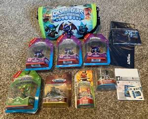 lot 117 image: Skylanders Spyros Adventure Toy Package - 7 Figures, Carrying Case and More - (3) Blastermind, Tuff Luck, Rubble Rouser, Fire Bone Hot Dog, Shark Tank