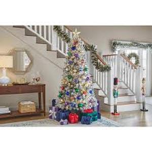 lot 49 image: Home Accents Holiday 6.5 ft. Pre-Lit LED Festive Pine Flocked Artificial Christmas Tree T3 Customer Returns See Pictures